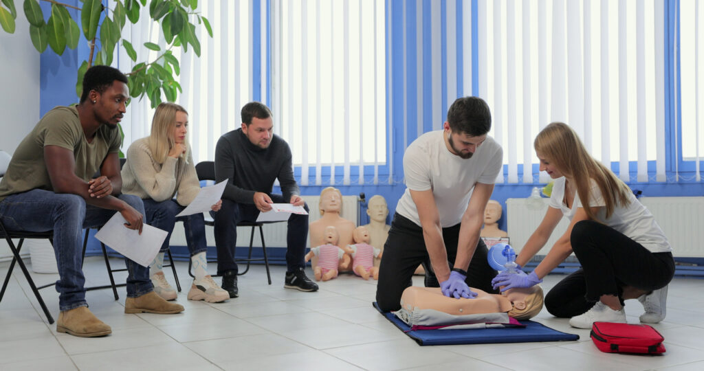 Employees completing a first aid course